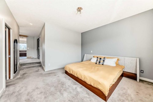 11 Cresthaven Bay Sw, Calgary, AB - Indoor Photo Showing Bedroom