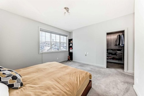 11 Cresthaven Bay Sw, Calgary, AB - Indoor Photo Showing Bedroom