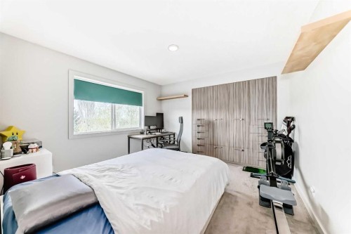 11 Cresthaven Bay Sw, Calgary, AB - Indoor Photo Showing Bedroom