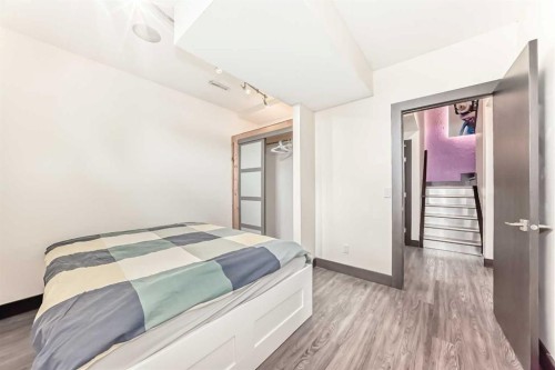 11 Cresthaven Bay Sw, Calgary, AB - Indoor Photo Showing Bedroom