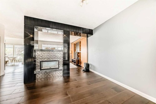 11 Cresthaven Bay Sw, Calgary, AB - Indoor With Fireplace