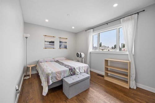311 Hawkland Place Nw, Calgary, AB - Indoor Photo Showing Bedroom