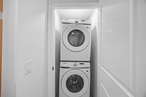 311 Hawkland Place Nw, Calgary, AB - Indoor Photo Showing Laundry Room
