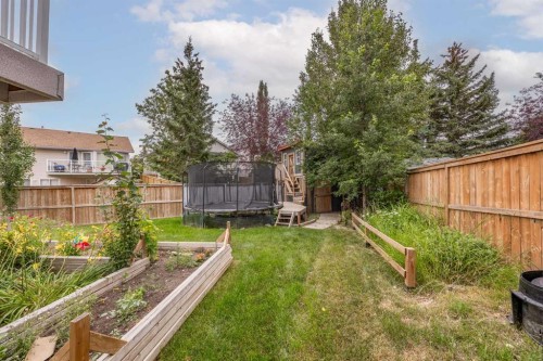 311 Hawkland Place Nw, Calgary, AB - Outdoor With Backyard