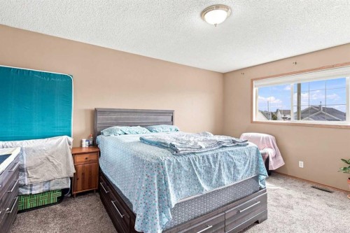 610 Saddlecreek Way Ne, Calgary, AB - Indoor Photo Showing Bedroom
