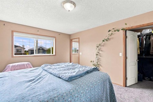 610 Saddlecreek Way Ne, Calgary, AB - Indoor Photo Showing Bedroom