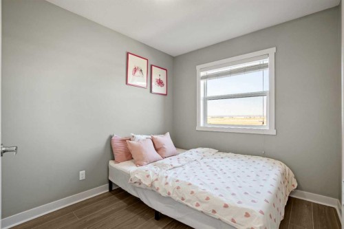 554 Redstone View Ne, Calgary, AB - Indoor Photo Showing Bedroom