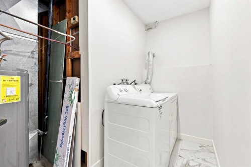 427 Falmere Road Ne, Calgary, AB - Indoor Photo Showing Laundry Room