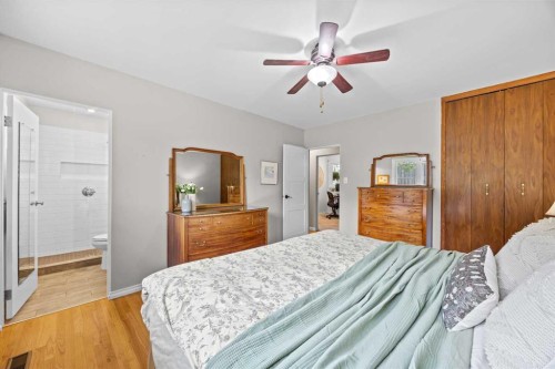 30 Gateway Drive Sw, Calgary, AB - Indoor Photo Showing Bedroom