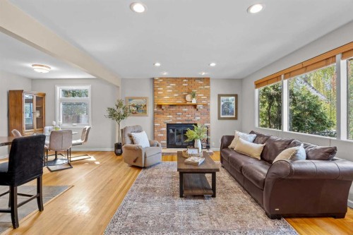 30 Gateway Drive Sw, Calgary, AB - Indoor Photo Showing Living Room With Fireplace