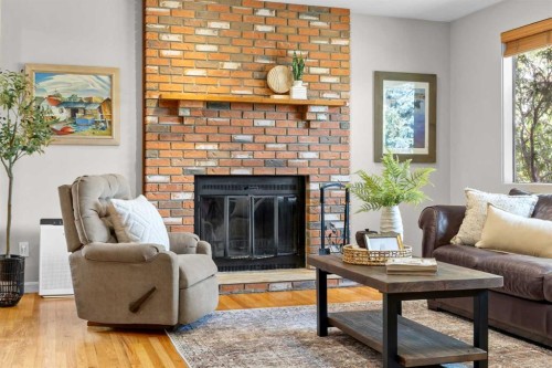 30 Gateway Drive Sw, Calgary, AB - Indoor Photo Showing Living Room With Fireplace