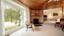 5015 Marchand Crescent Ne, Calgary, AB  - Indoor Photo Showing Living Room With Fireplace 