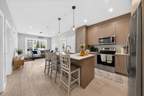 2112-681 Savanna Boulevard Ne, Calgary, AB - Indoor Photo Showing Kitchen With Upgraded Kitchen