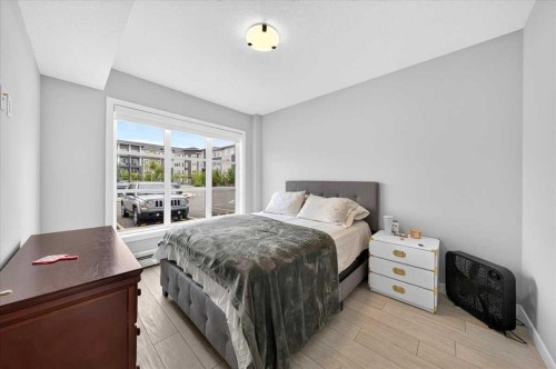 2112-681 Savanna Boulevard Ne, Calgary, AB - Indoor Photo Showing Bedroom