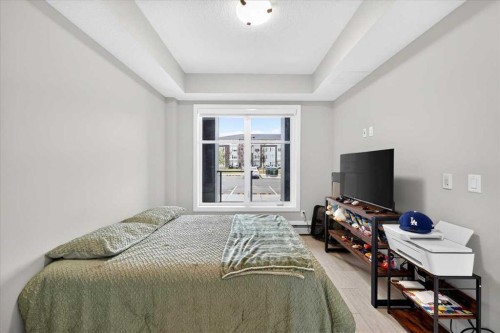 2112-681 Savanna Boulevard Ne, Calgary, AB - Indoor Photo Showing Bedroom