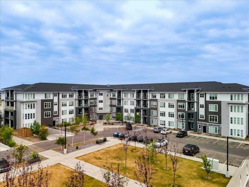 2112-681 Savanna Boulevard Ne, Calgary, AB - Outdoor With Balcony With Facade