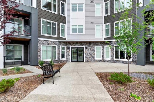 2112-681 Savanna Boulevard Ne, Calgary, AB - Outdoor With Balcony With Facade