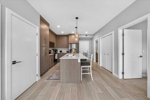 2112-681 Savanna Boulevard Ne, Calgary, AB - Indoor Photo Showing Kitchen