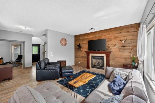 363 Evanston View Nw, Calgary, AB - Indoor Photo Showing Living Room With Fireplace