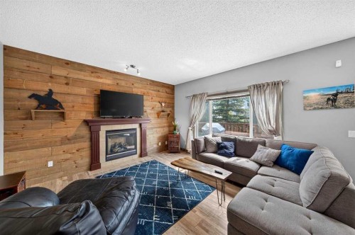 363 Evanston View Nw, Calgary, AB - Indoor Photo Showing Living Room With Fireplace