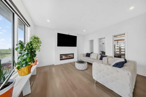 105 Homestead Crescent Ne, Calgary, AB - Indoor Photo Showing Living Room With Fireplace