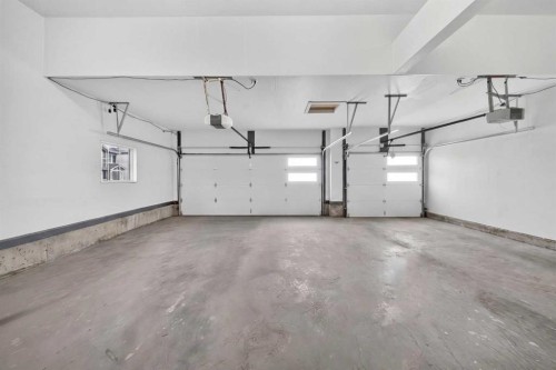 105 Homestead Crescent Ne, Calgary, AB - Indoor Photo Showing Garage