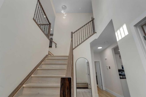 156 Rainbow Falls Heath, Chestermere, AB - Indoor Photo Showing Other Room