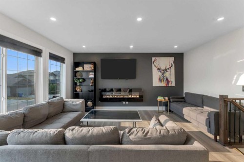 156 Rainbow Falls Heath, Chestermere, AB - Indoor Photo Showing Living Room