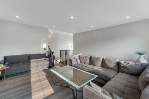 156 Rainbow Falls Heath, Chestermere, AB - Indoor Photo Showing Living Room