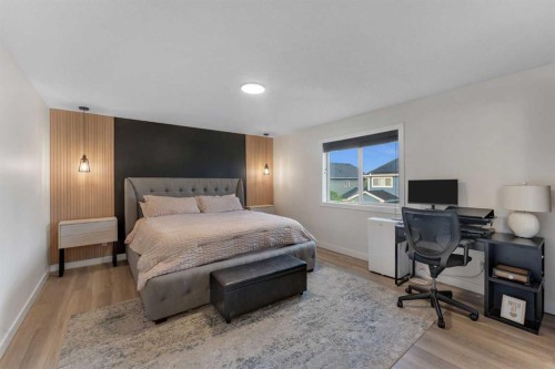 156 Rainbow Falls Heath, Chestermere, AB - Indoor Photo Showing Bedroom