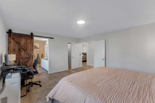 156 Rainbow Falls Heath, Chestermere, AB - Indoor Photo Showing Bedroom