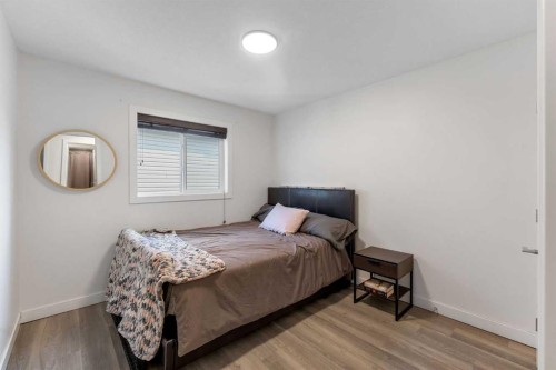 156 Rainbow Falls Heath, Chestermere, AB - Indoor Photo Showing Bedroom