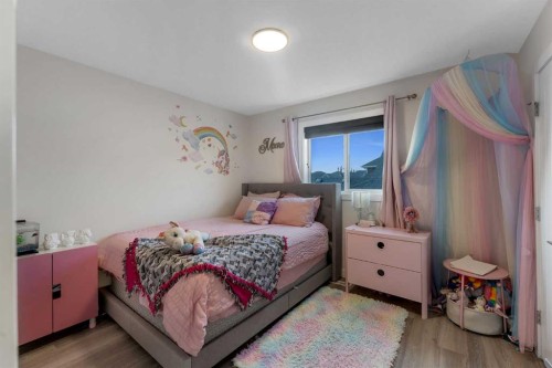 156 Rainbow Falls Heath, Chestermere, AB - Indoor Photo Showing Bedroom