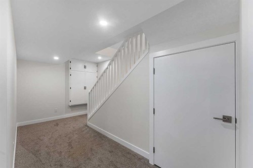 156 Rainbow Falls Heath, Chestermere, AB - Indoor Photo Showing Other Room