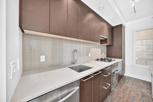 458-222 Riverfront Avenue Sw, Calgary, AB - Indoor Photo Showing Kitchen With Upgraded Kitchen