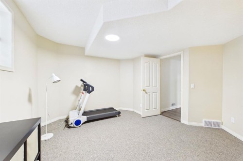 15 Royal Crest Terrace Nw, Calgary, AB - Indoor Photo Showing Gym Room