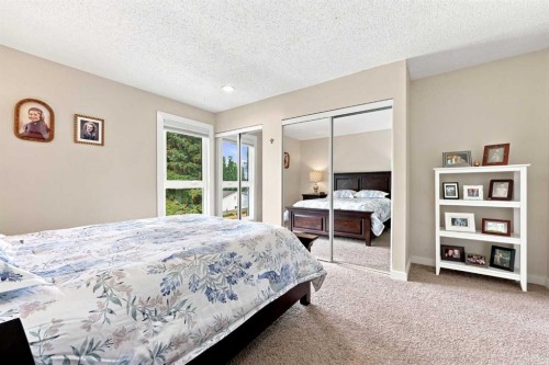 412-13104 Elbow Drive Sw, Calgary, AB - Indoor Photo Showing Bedroom