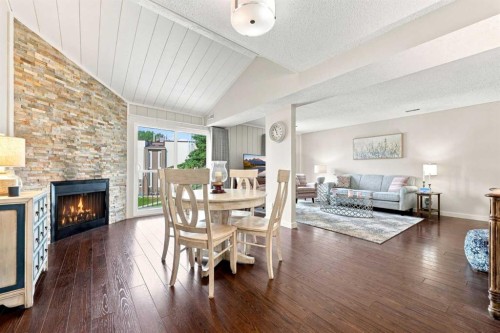 412-13104 Elbow Drive Sw, Calgary, AB - Indoor With Fireplace