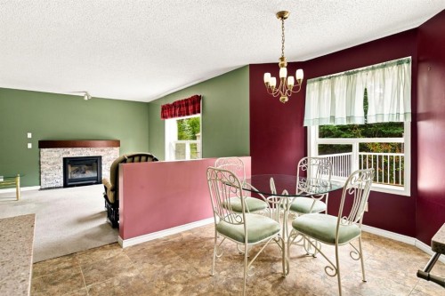9216 Edgebrook Drive Nw, Calgary, AB - Indoor Photo Showing Other Room With Fireplace