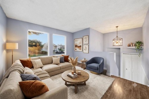 52 Erin Meadows Court Se, Calgary, AB - Indoor Photo Showing Living Room