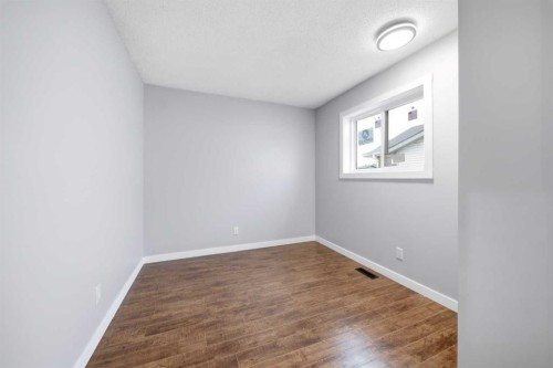 52 Erin Meadows Court Se, Calgary, AB - Indoor Photo Showing Other Room