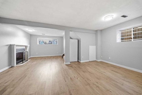 52 Erin Meadows Court Se, Calgary, AB - Indoor With Fireplace