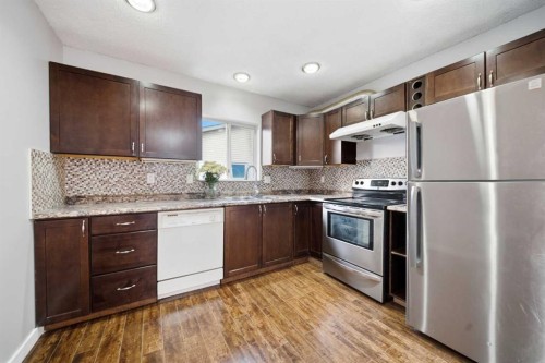 52 Erin Meadows Court Se, Calgary, AB - Indoor Photo Showing Kitchen