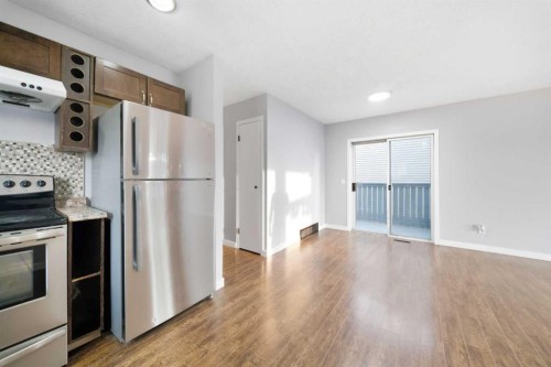 52 Erin Meadows Court Se, Calgary, AB - Indoor Photo Showing Kitchen