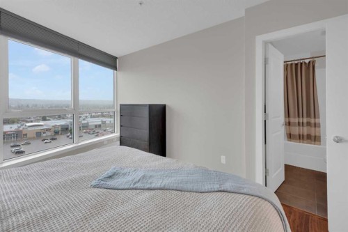 1103-77 Spruce Place Sw, Calgary, AB - Indoor Photo Showing Bedroom