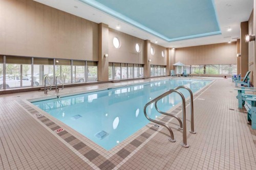1103-77 Spruce Place Sw, Calgary, AB - Indoor Photo Showing Other Room With In Ground Pool