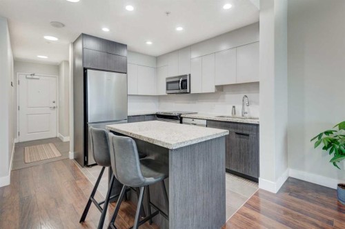 1103-77 Spruce Place Sw, Calgary, AB - Indoor Photo Showing Kitchen With Upgraded Kitchen