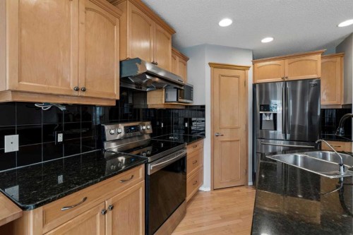 22 Somerside Crescent Sw, Calgary, AB - Indoor Photo Showing Kitchen With Double Sink