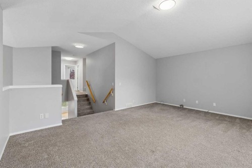22 Somerside Crescent Sw, Calgary, AB - Indoor Photo Showing Other Room