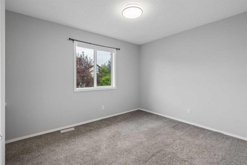 22 Somerside Crescent Sw, Calgary, AB - Indoor Photo Showing Other Room